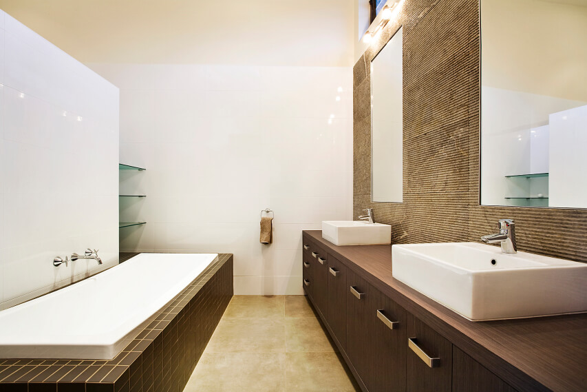 Red Hill Residence’s spacious bathroom with a long narrow bath tub