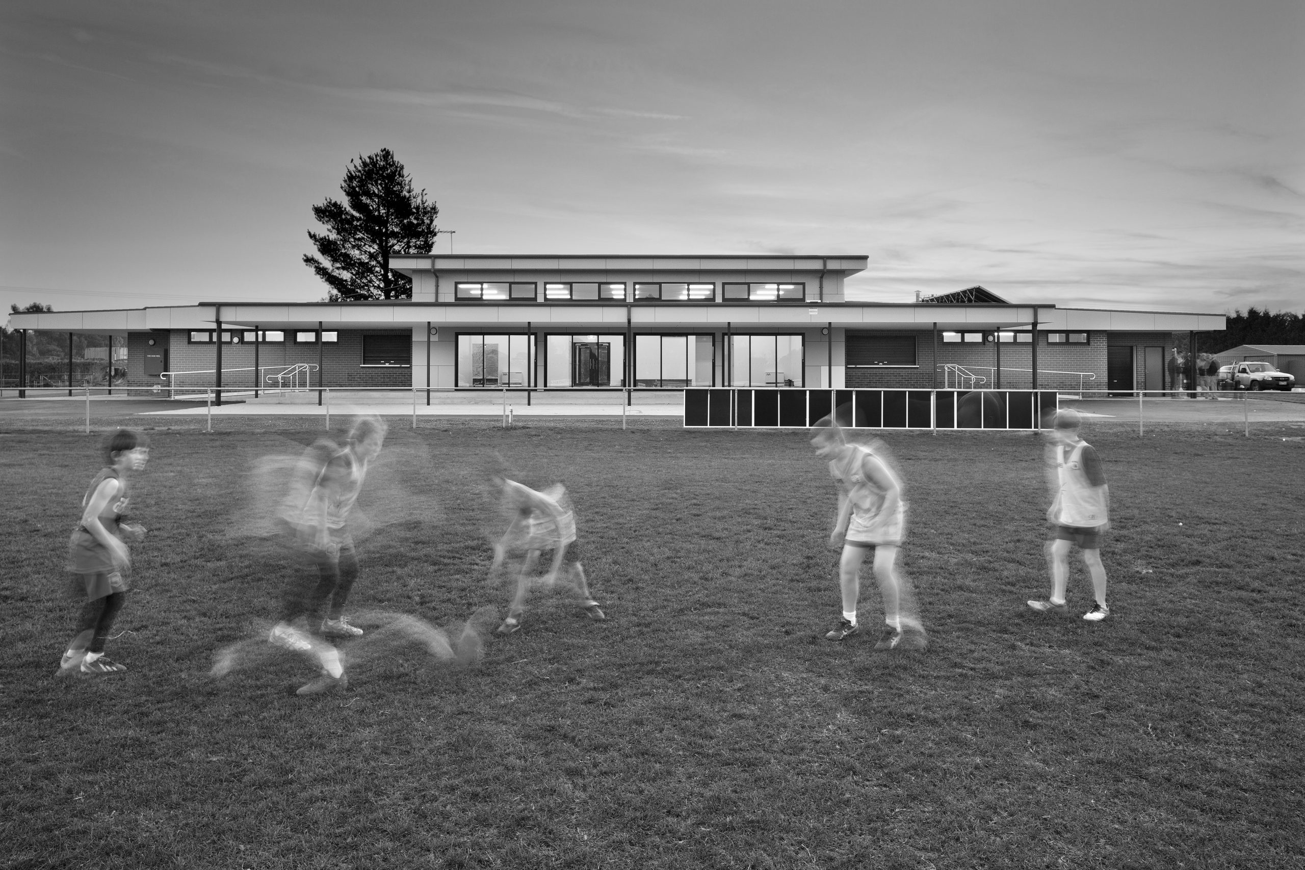 children playing soccer at Romsey Park Community Pavilion field